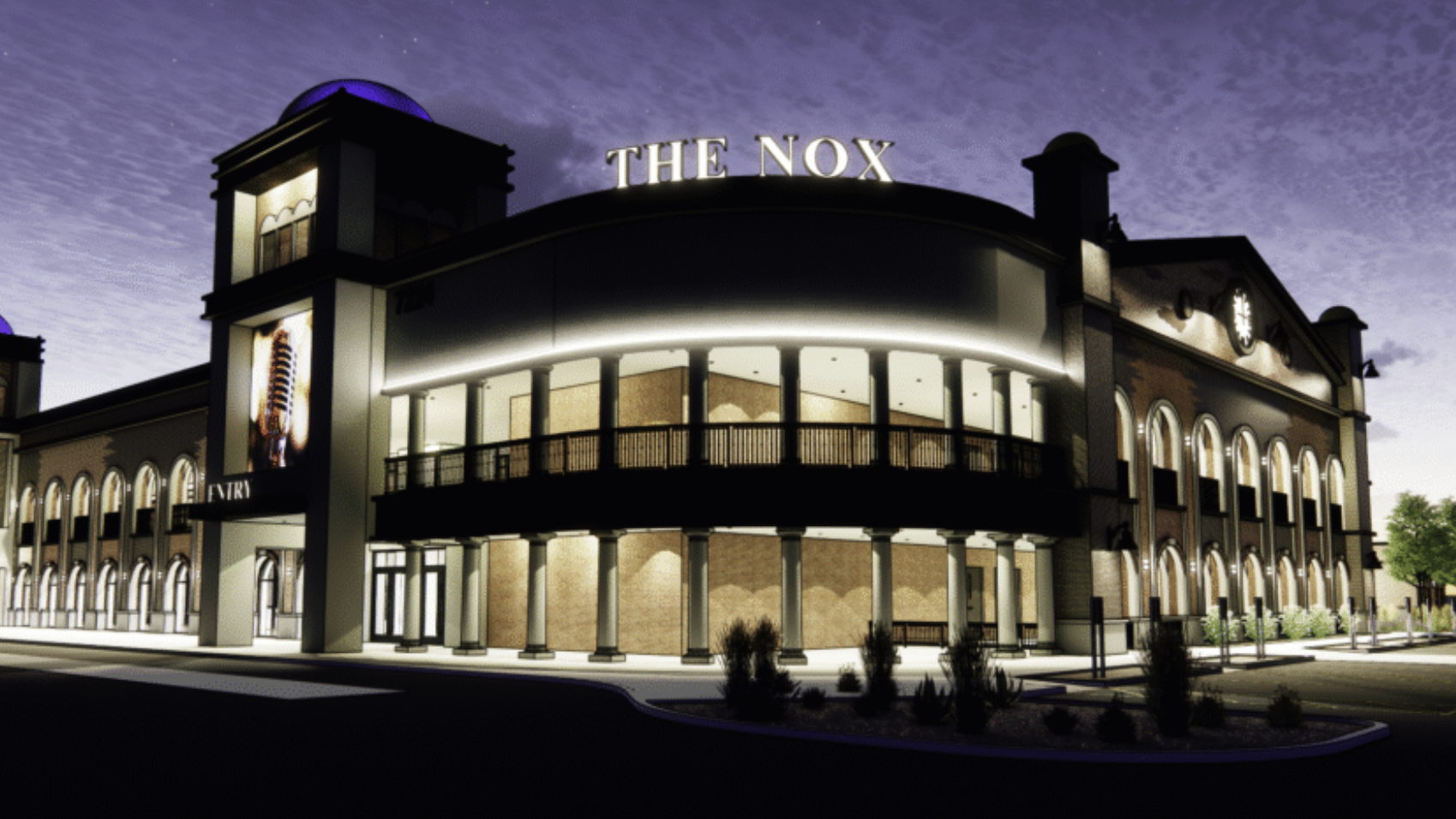 Night rendering of The Nox concert venue exterior showing illuminated rooftop signage, arched colonnades on two levels, and a balcony level with warm uplighting on tan stone columns