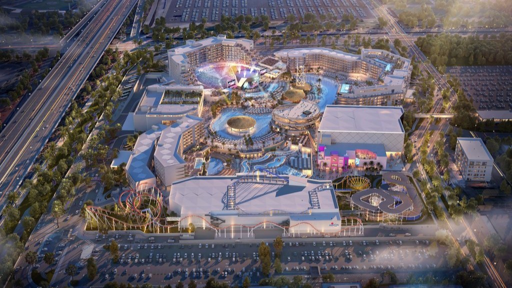 Aerial architectural rendering of the full VAI Resort campus in Glendale, showing a central water park, concert venue, roller coasters, hotel towers, and extensive parking near a freeway
