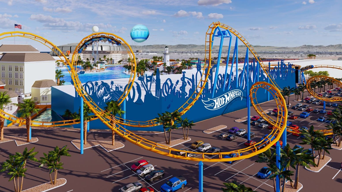 Architectural rendering of a Hot Wheels-branded roller coaster with bright yellow track and blue support structures, next to a parking lot with palm trees and a blue building bearing the Hot Wheels logo
